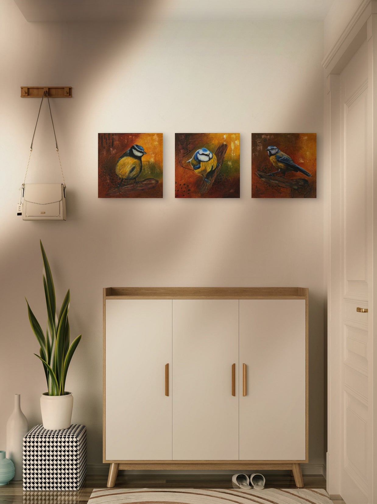 A bright hallway featuring an arrangement of 3 blue tit paintings.