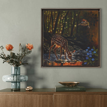 hallway side cupboard with flowers and painting of foe deer in the woods.