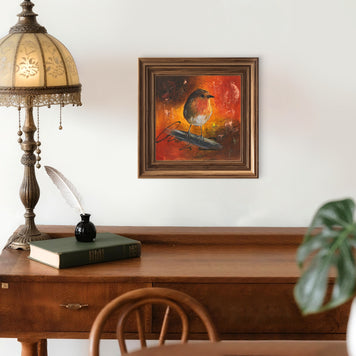 Traditional office space featuring a robin painting.