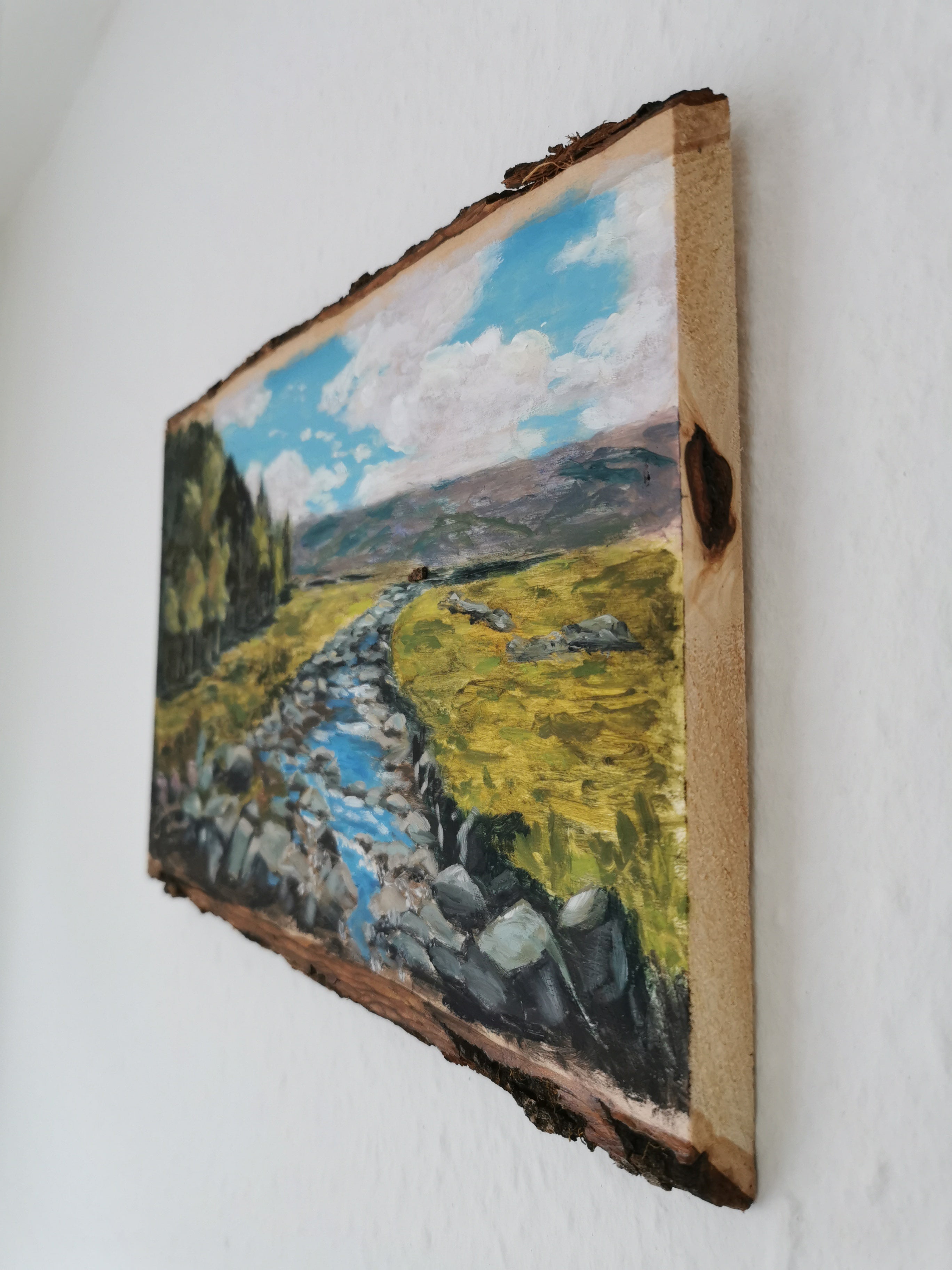 side view of the Scottish landscape painting on wooden board