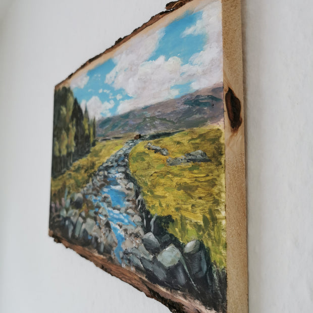 side view of the Scottish landscape painting on wooden board